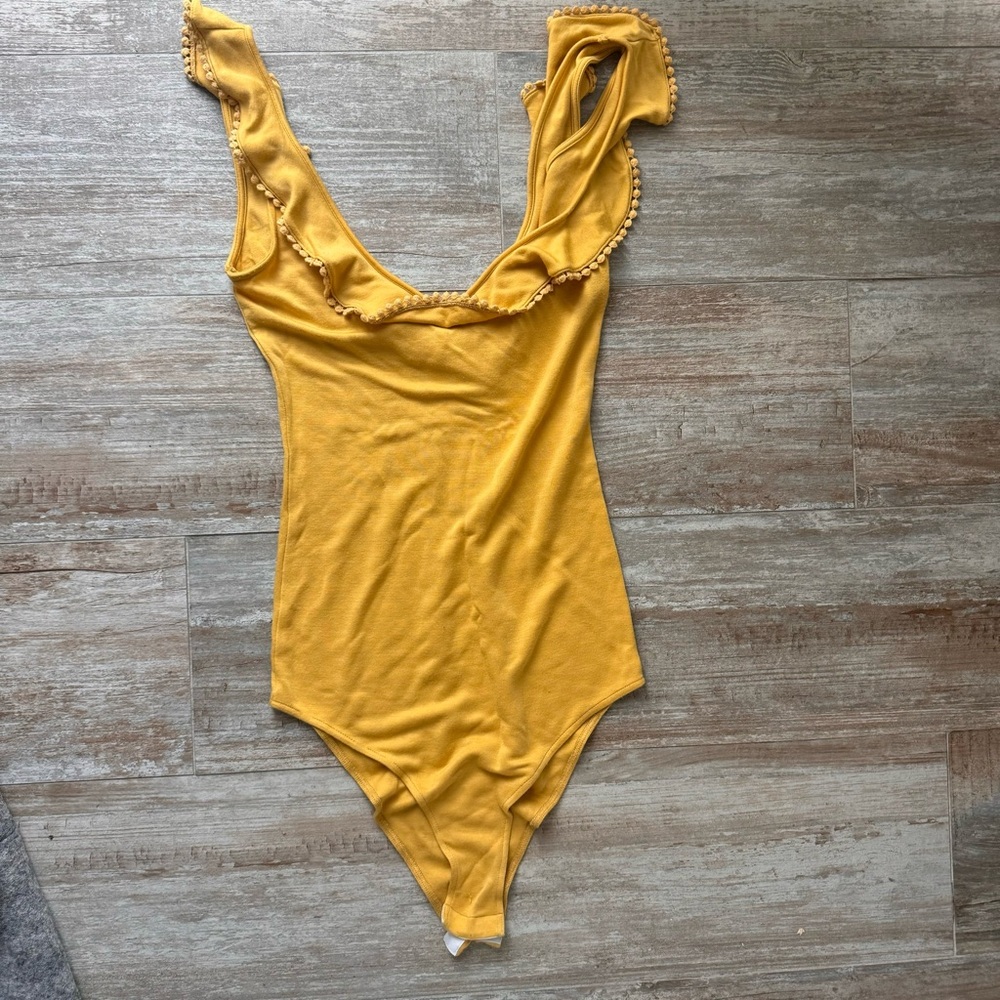 Yellow Ruffled bodysuit